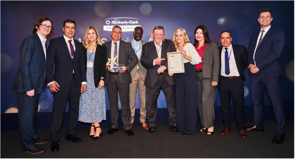 An image of the key enviro team accepting their awards at the Kimberley Clark Gold Service Awards